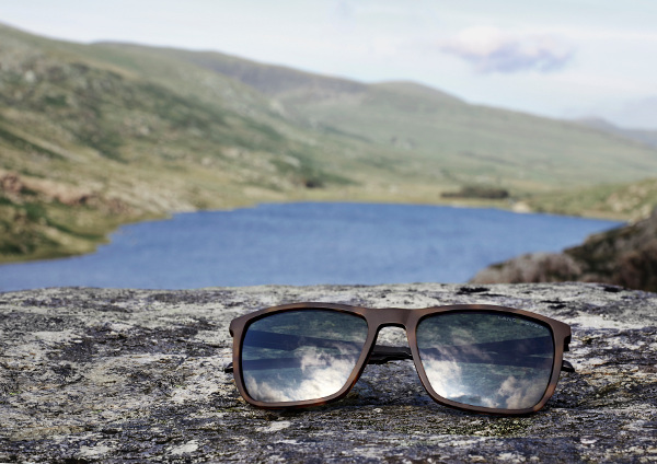 Pair of Eyespace Land Rover Sunglasses on a rock