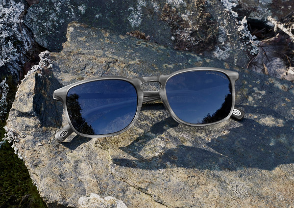 Pair of Eyespace Land Rover Sunglasses on a rock